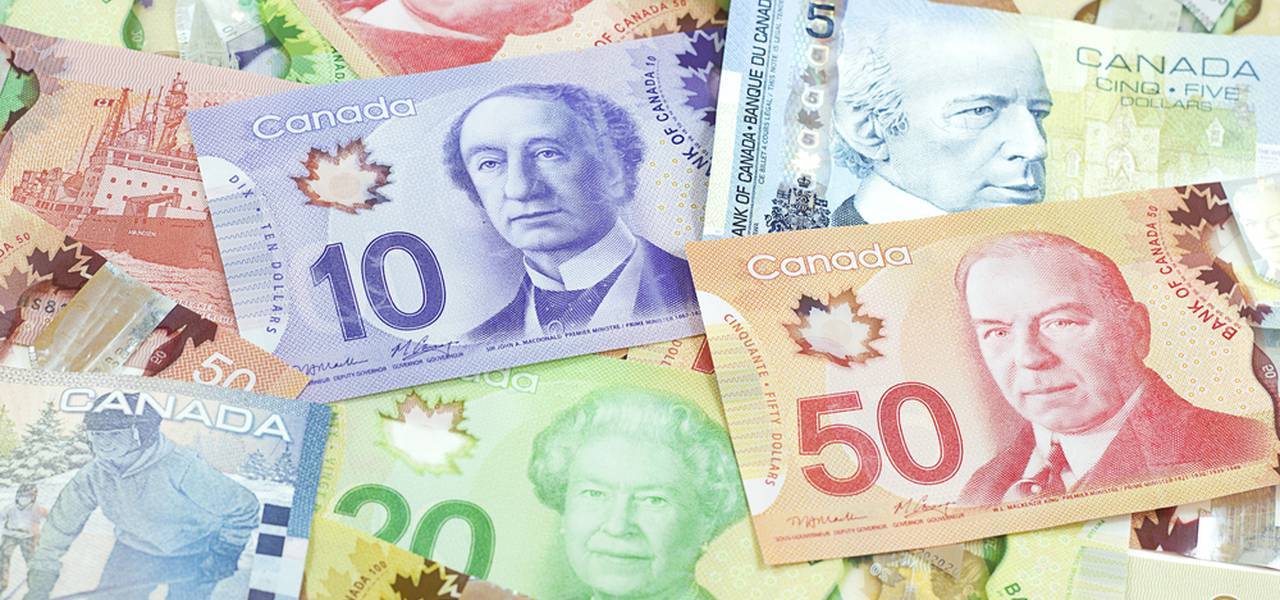 تداول الدولار الكندي على المؤشرات الاقتصادية.